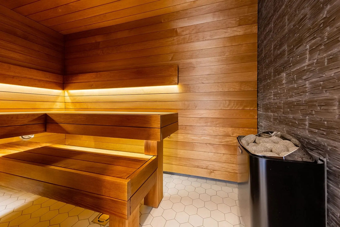 Wooden sauna bench with bucket