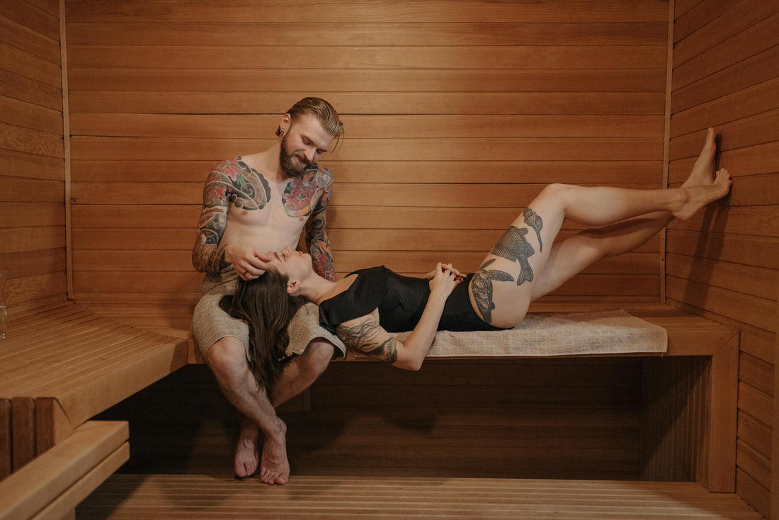 A man and a woman in a sauna.