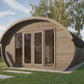 Saunamo Hobbit 500: round wooden sauna with glass doors.