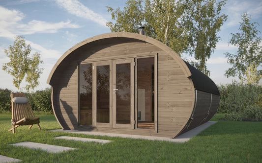 Saunamo Hobbit 500: round wooden sauna with glass doors.