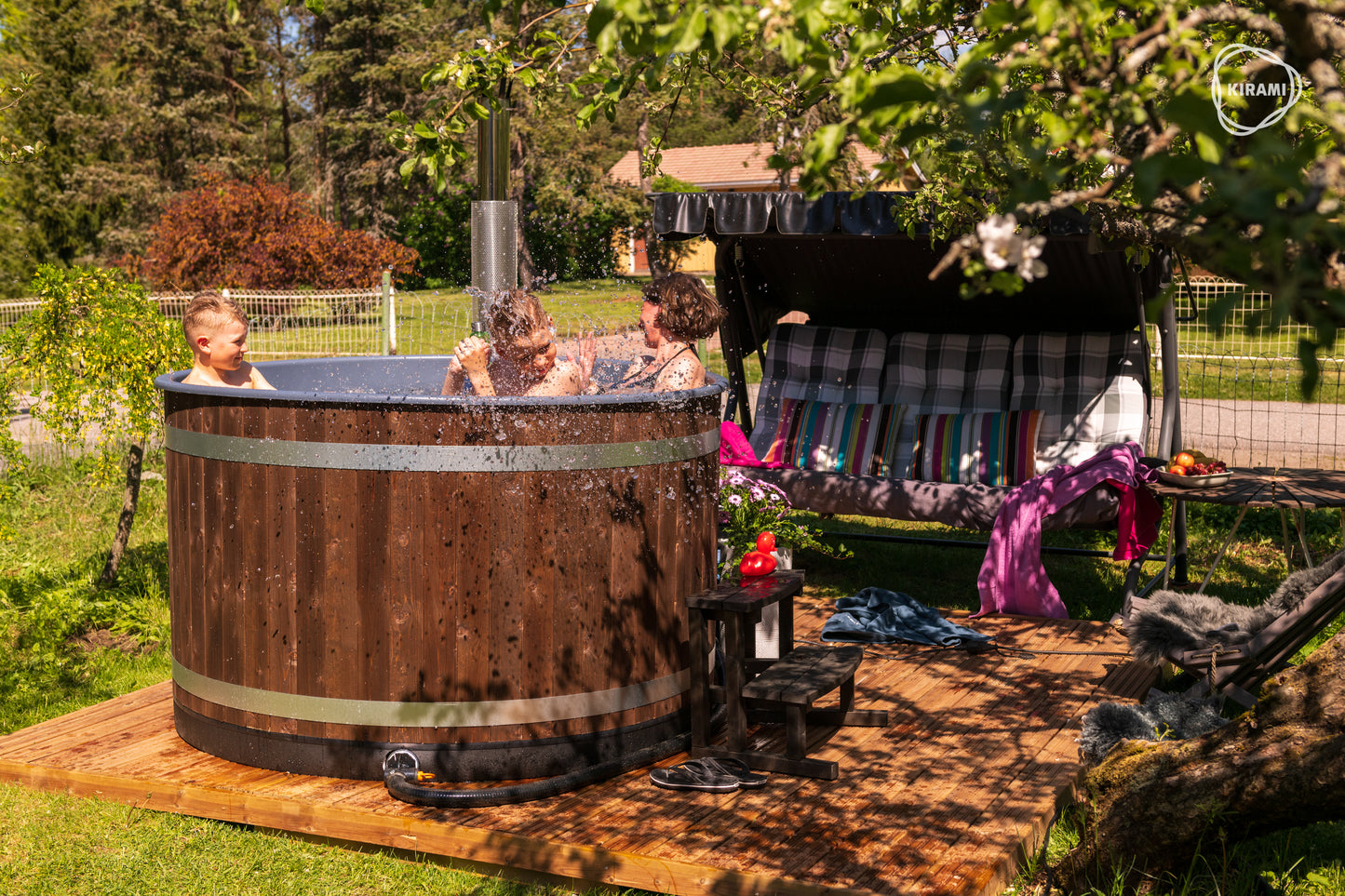 Hazy M Outdoor Jacuzzi with relaxing group.