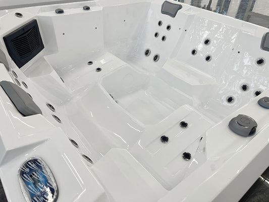 Hydra 215 outdoor Jacuzzi with black handles.