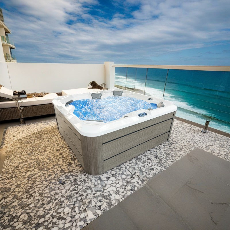 Hydra 200 Jacuzzi on a terrace overlooking the sea.