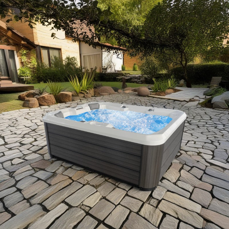 Saunamo Hydra 170 whirlpool bath in a backyard.