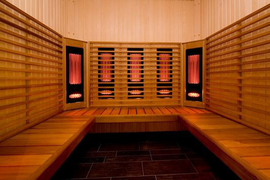 Harvia Comfort infrared radiator in an illuminated sauna.