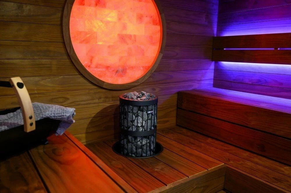 Harvia Legend electric sauna heater with stones and round light