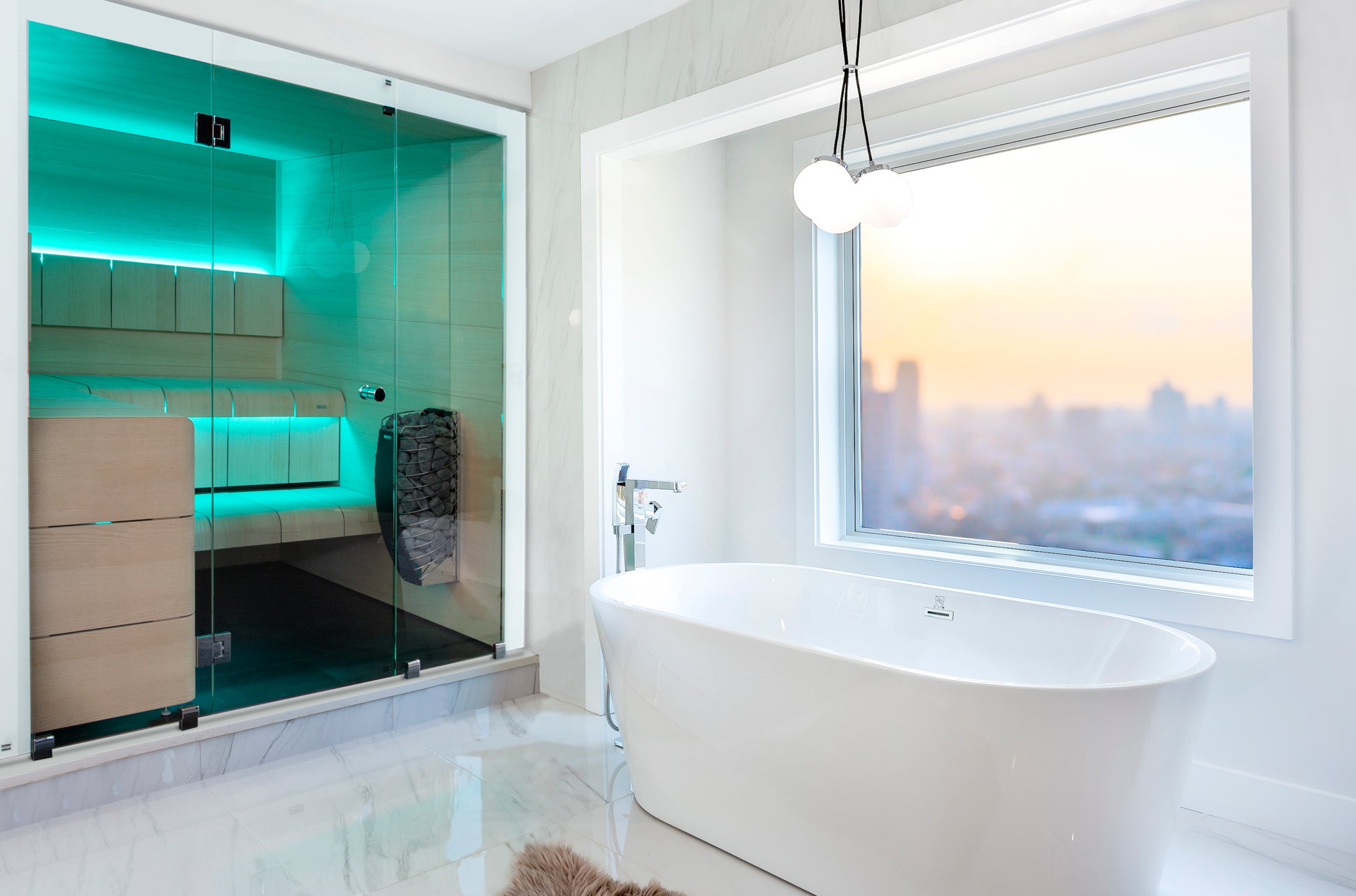 Ventura sauna in bathroom with bathtub and glass shower.