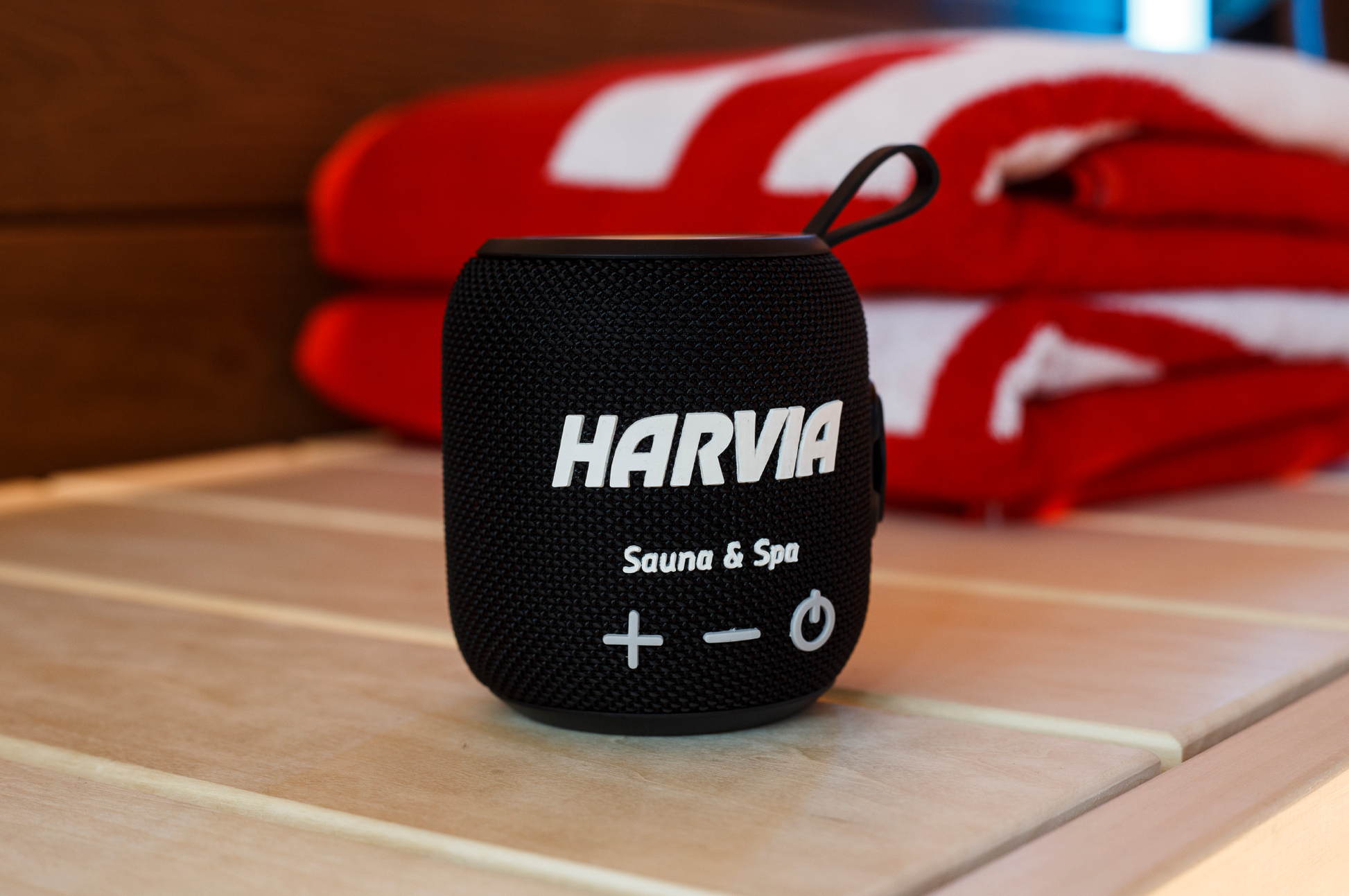 Harvia Sauna Bluetooth Speaker on table.