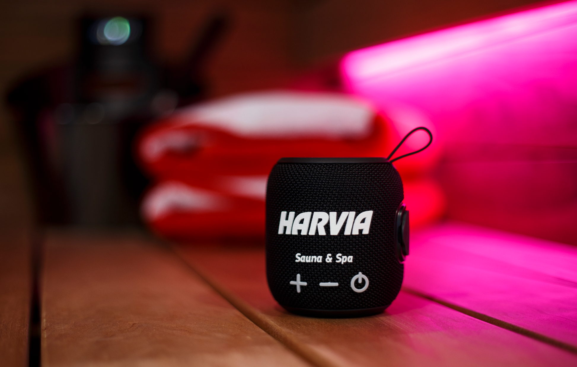 Harvia Bluetooth sauna speaker with wooden surface.