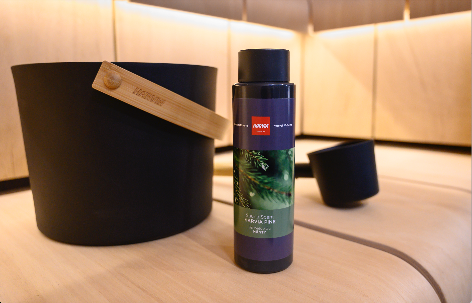 Harvia Sauna Essence - Pine Aroma (400 ml) on the table.