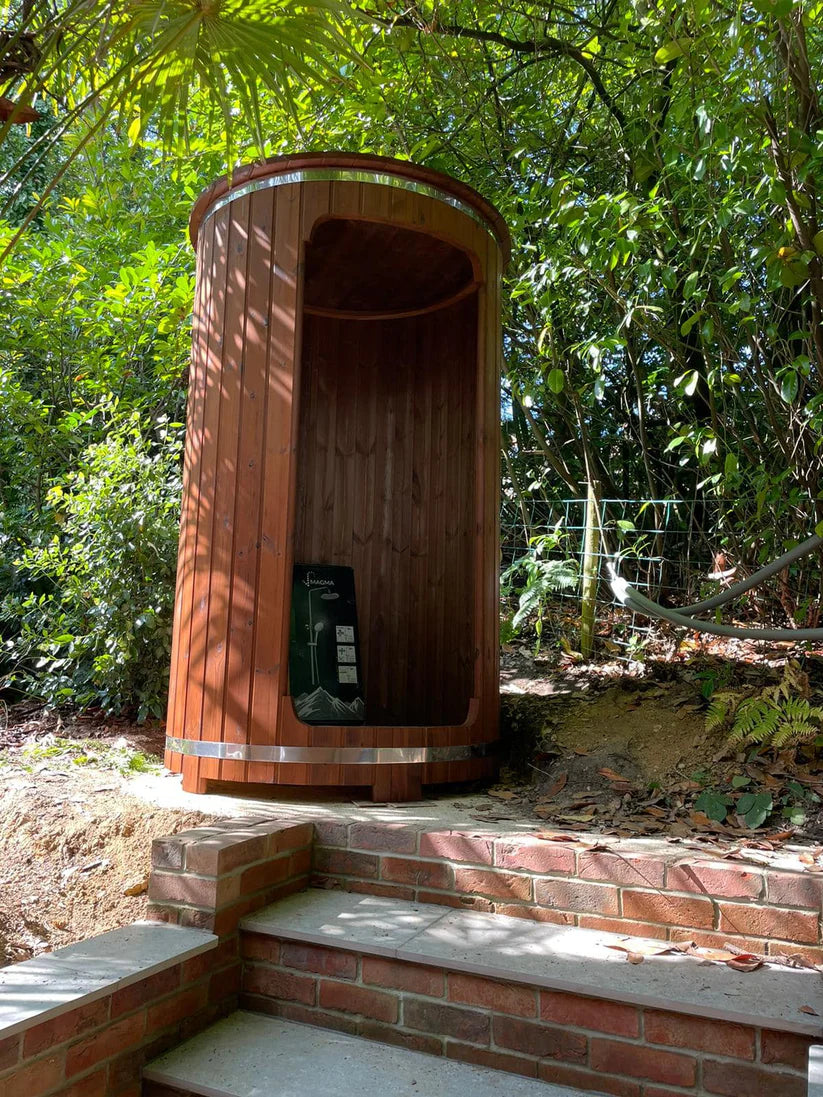 Barrel shower in a natural setting.