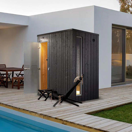 KUUT - Outdoor steam sauna next to the pool.