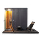 KUUT - Outdoor steam sauna next to a dog and chair.