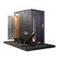 KUUT - Outdoor steam sauna with open door and chair.