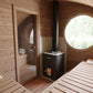 Outdoor sauna Saunamo Hobbit 300 with round window and compartment for firewood.