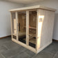 Large indoor sauna with tempered glass doors.