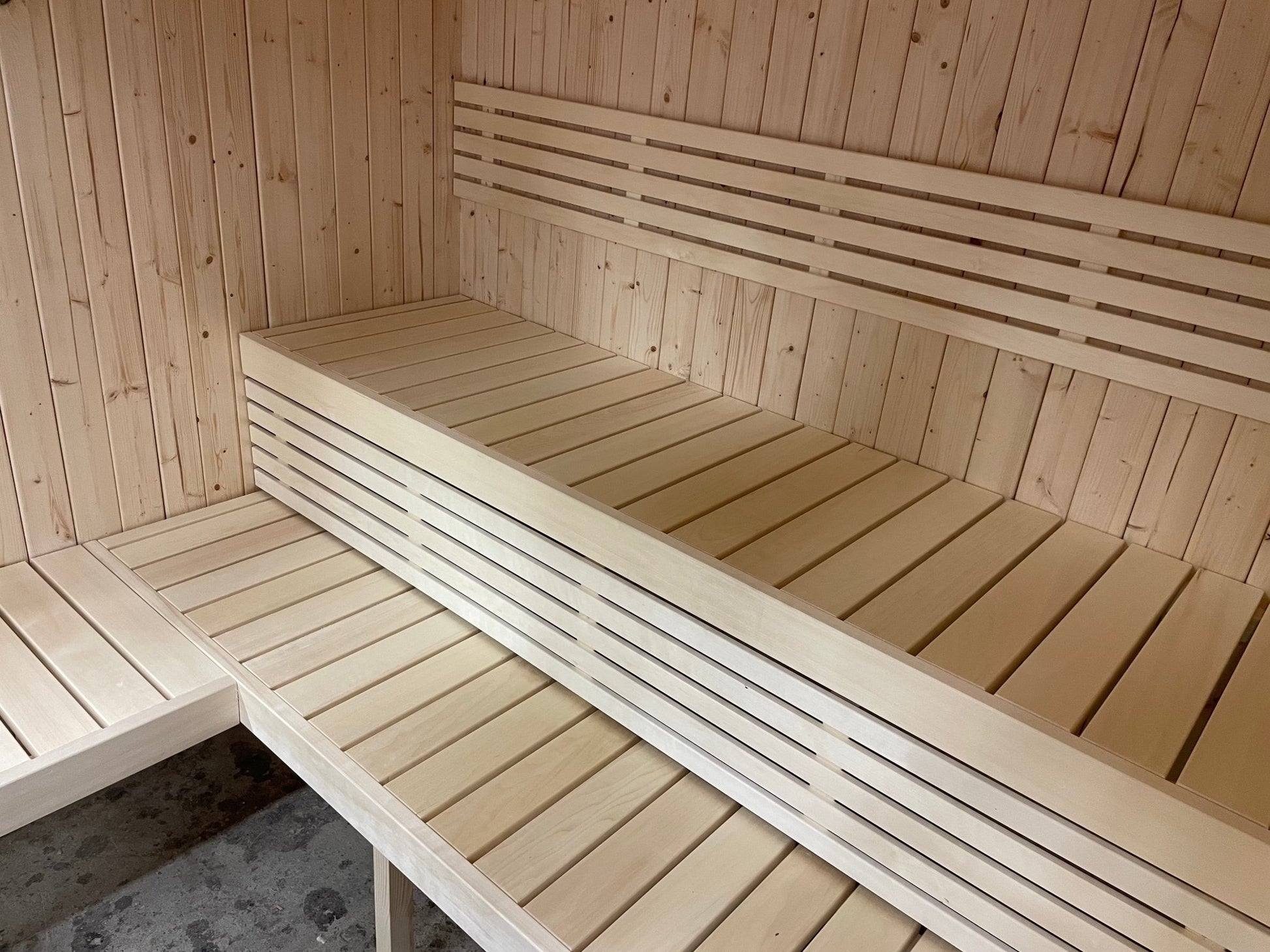 Wooden bench in the Large Indoor Sauna.