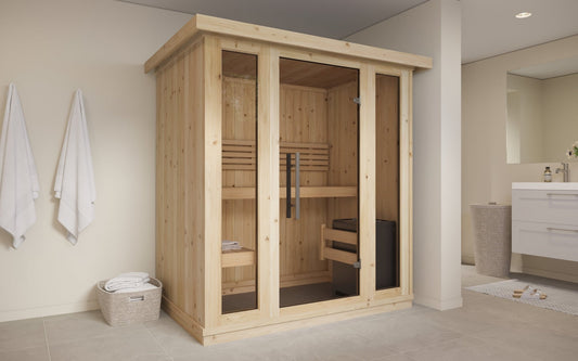 Mini wooden indoor sauna with glass doors.