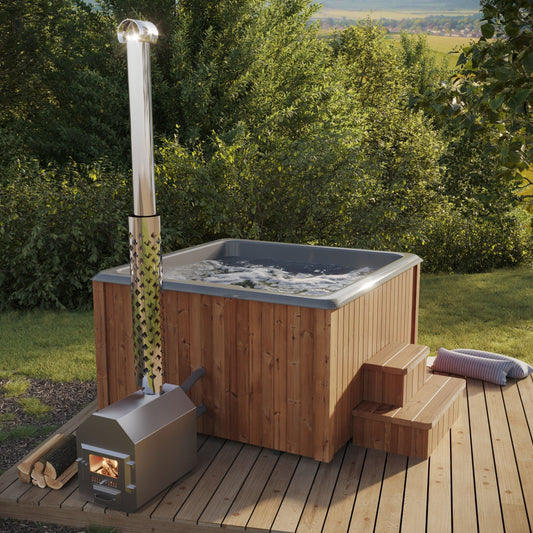 Bathtub Saunamo Thermalux 190 with wood heater on outdoor deck.