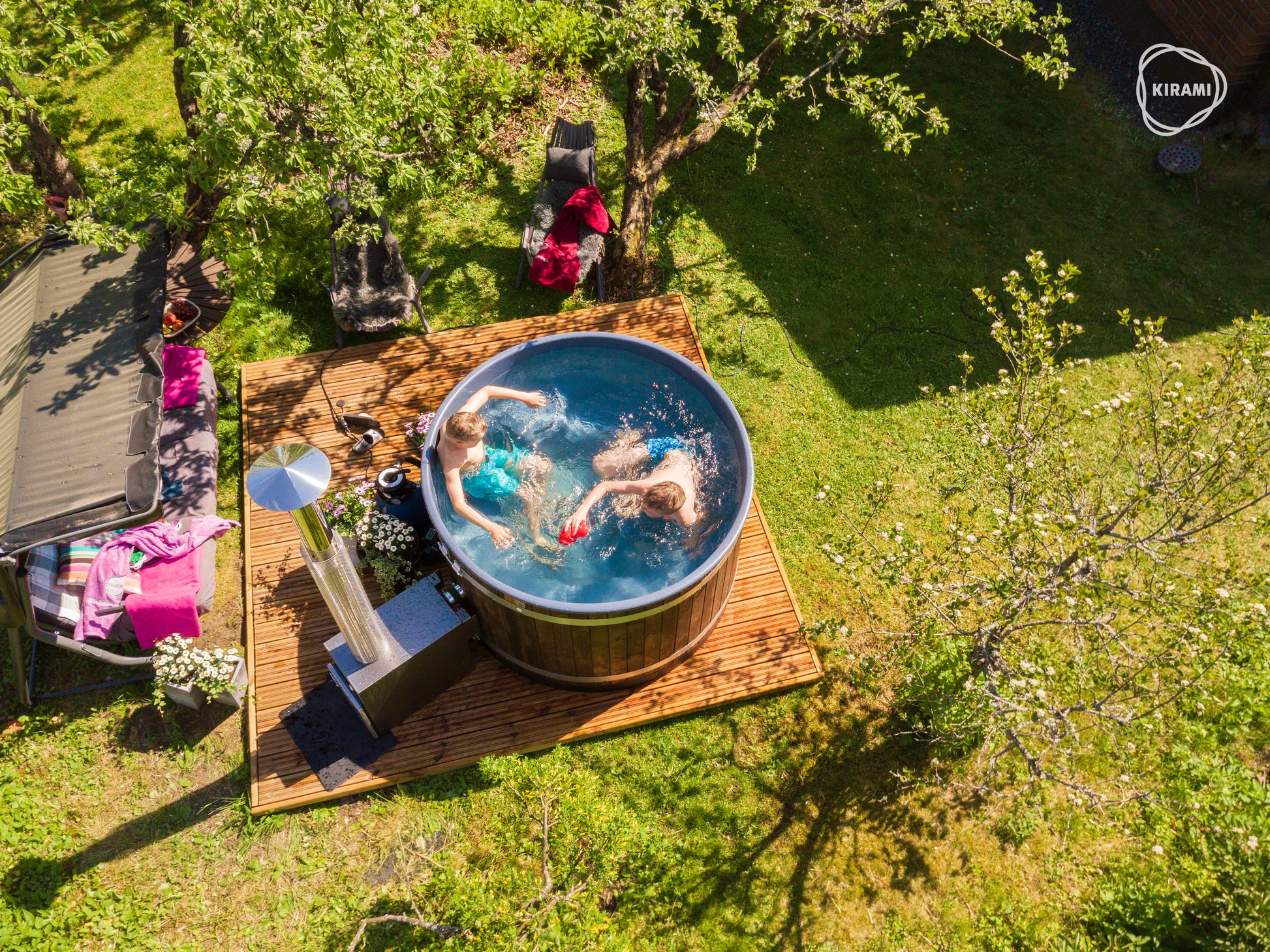 Hazy M Outdoor Jacuzzi with people relaxing.